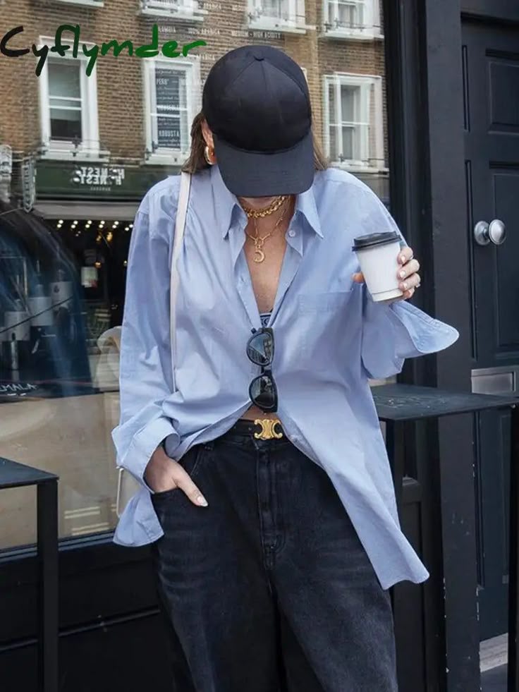 Oversized shirt and wide-leg jeans street style